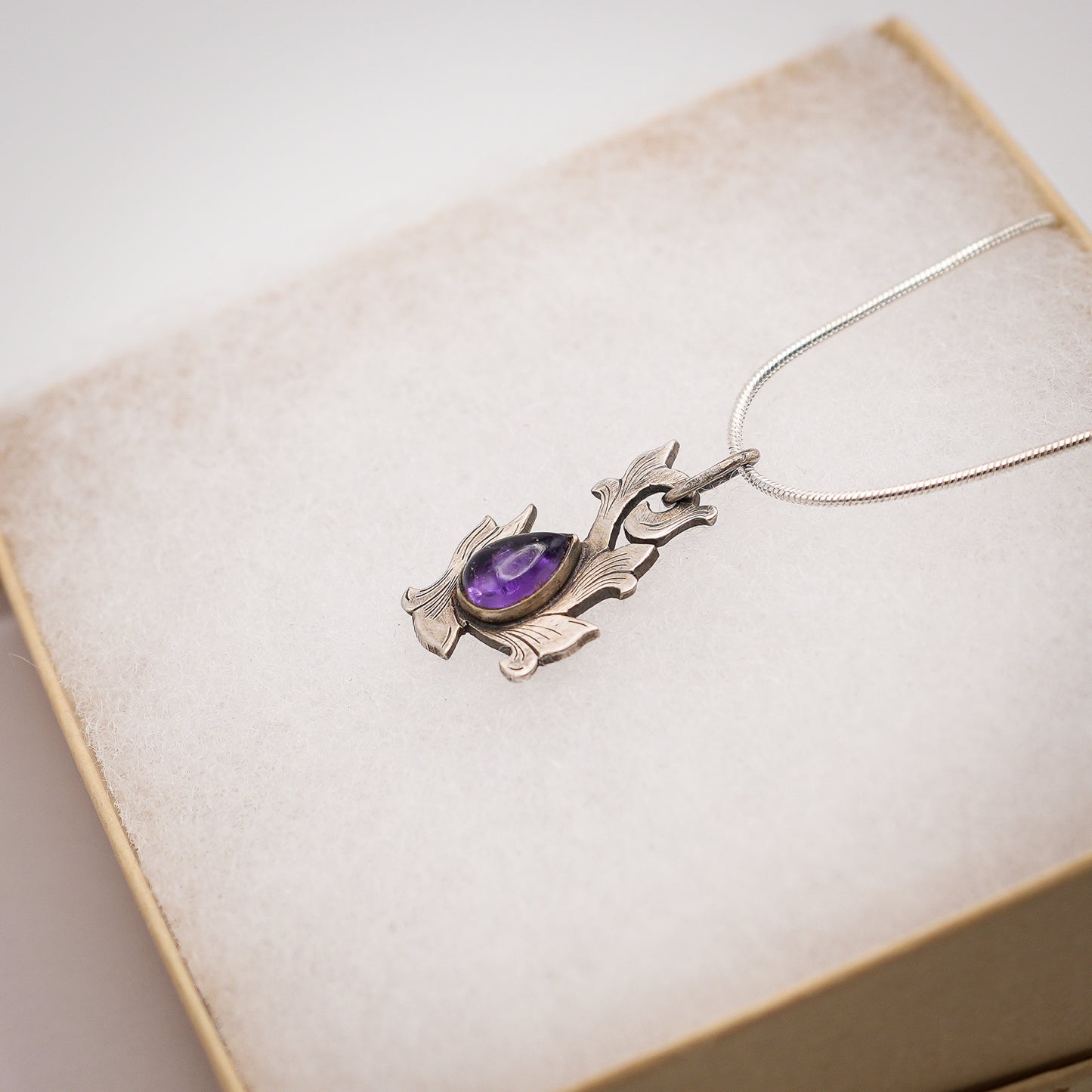 Scrolls Of Tradition Amethyst Pendant