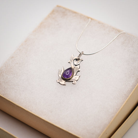 Scrolls Of Tradition Amethyst Pendant