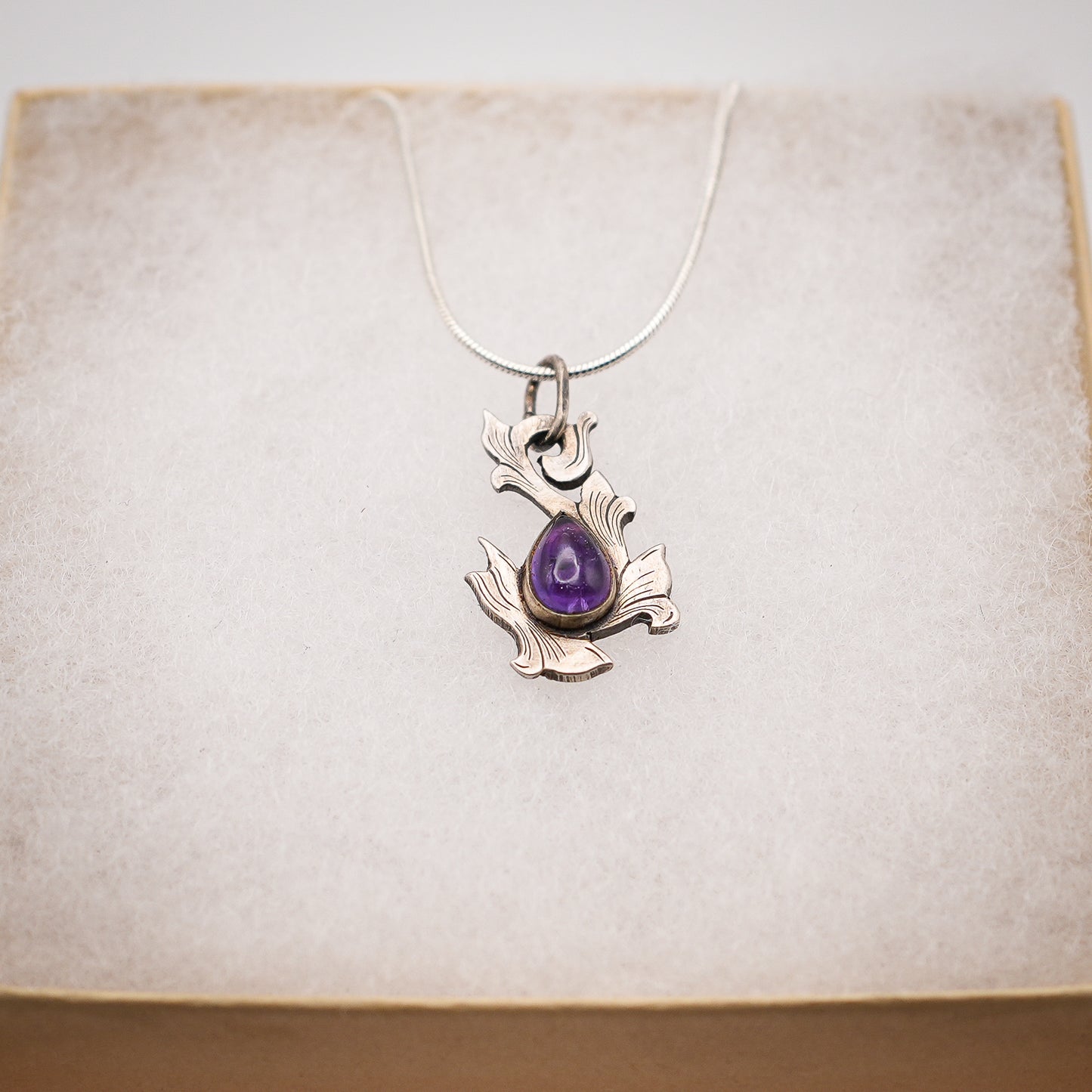 Scrolls Of Tradition Amethyst Pendant