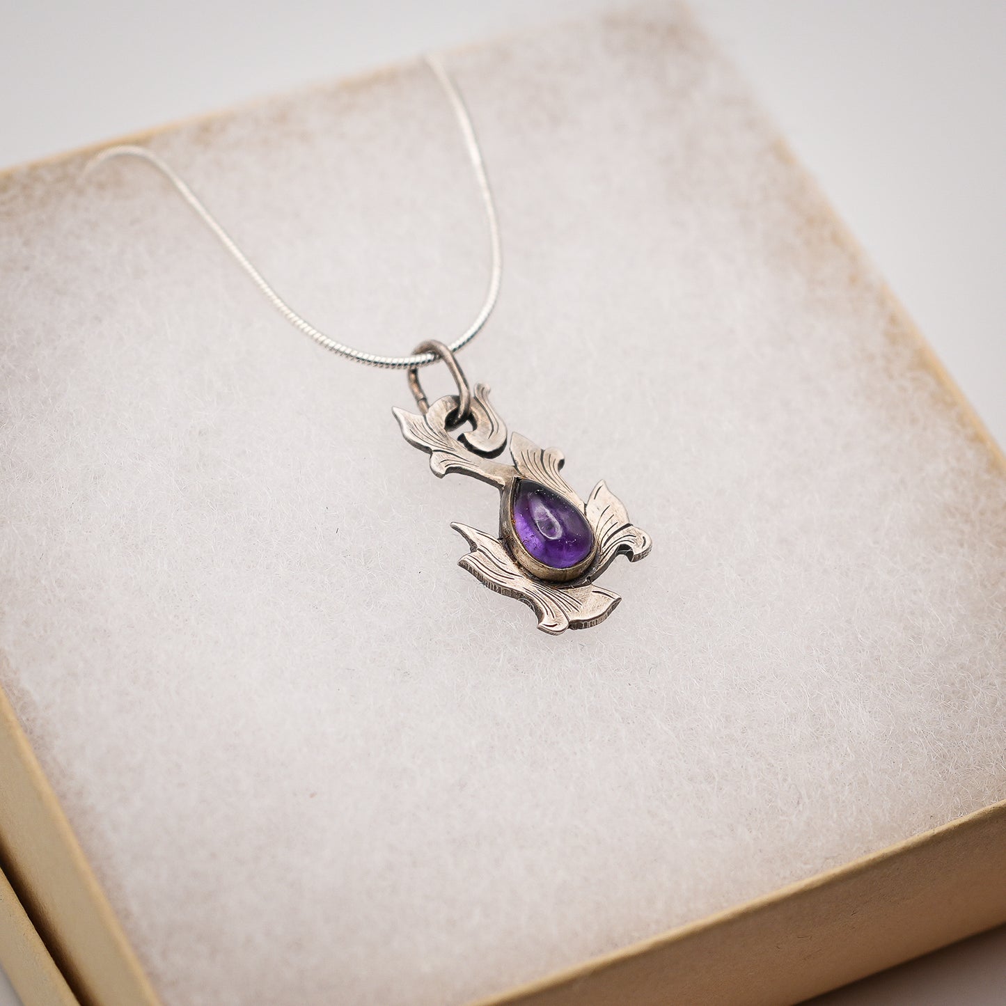 Scrolls Of Tradition Amethyst Pendant